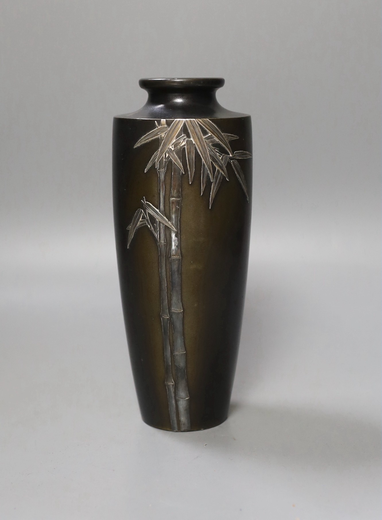 A signed Japanese bronze and mixed metal vase, 21cm